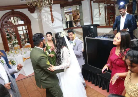 Guests dancing at a wedding reception
